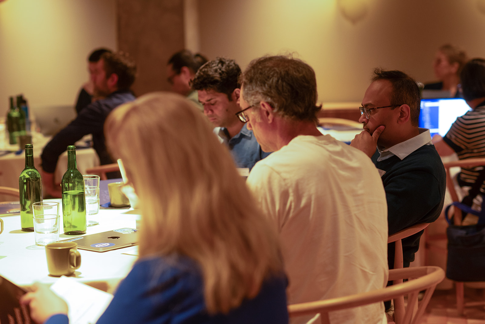 Leaders heads-down on the guided exercises during the hands-on session.
